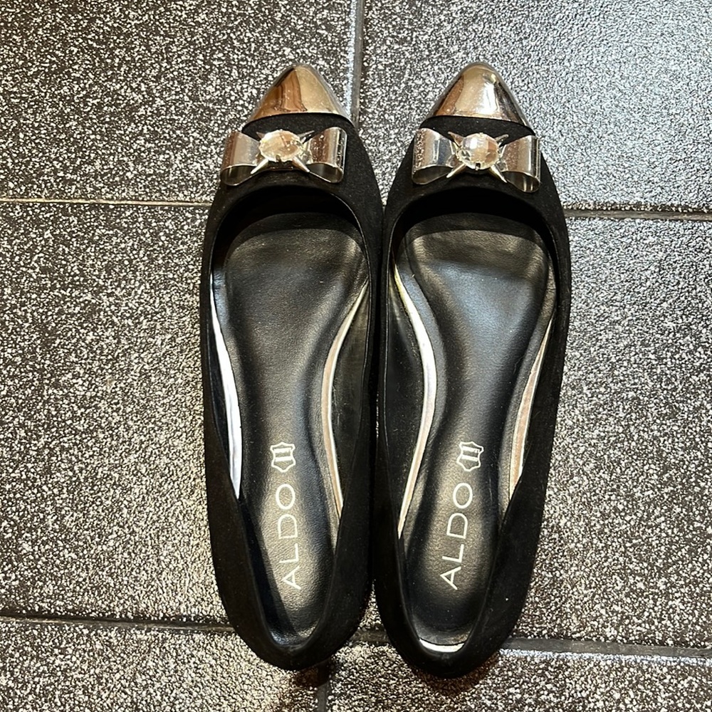 Aldo black pointy toe flats with silver and crystal embellishments.